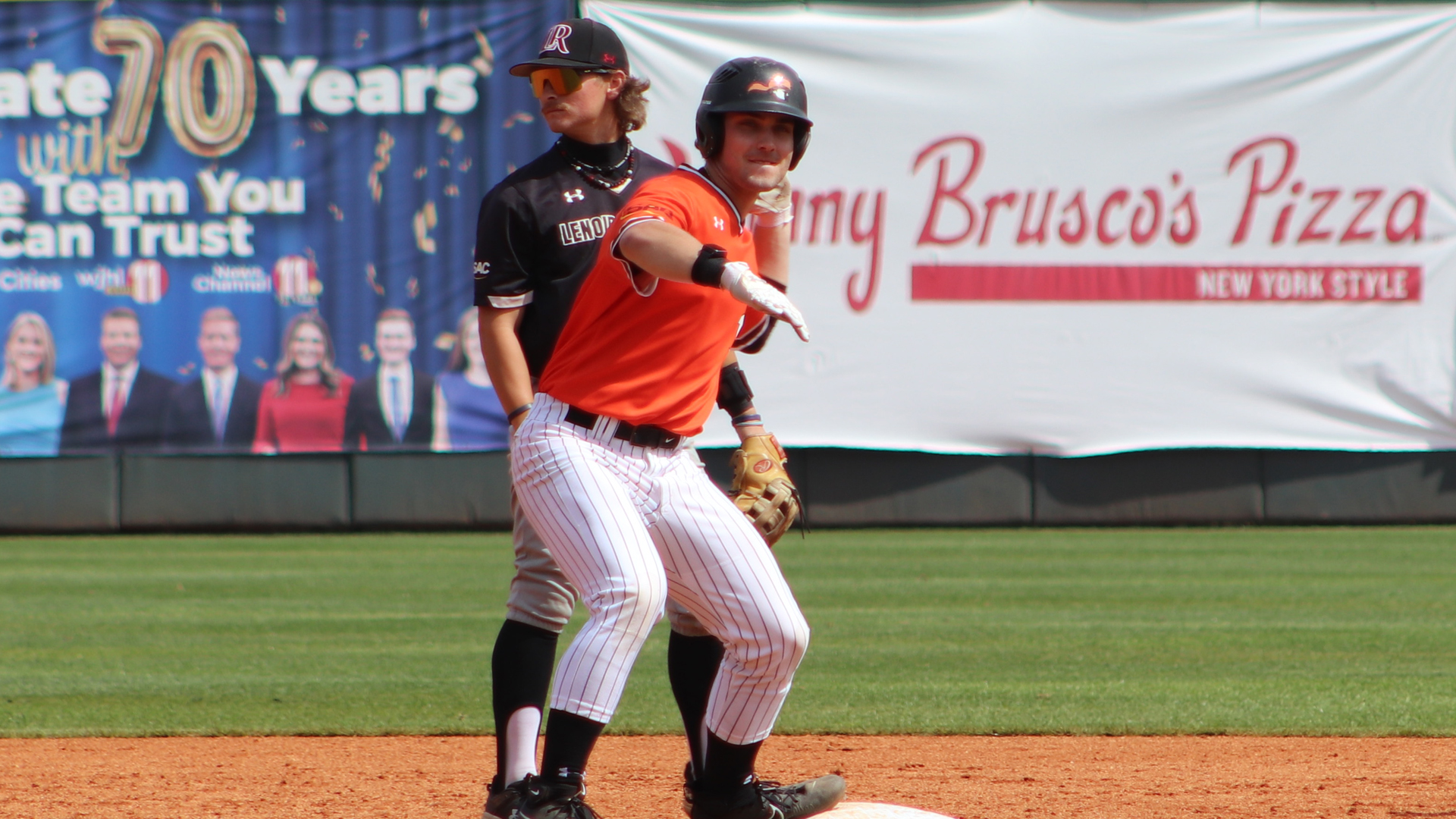 Jake Absher celebrates his two-run double in the second inning in Tusculum's 15-3 win over Lenoir-Rhyne (photo by Connor Keating)