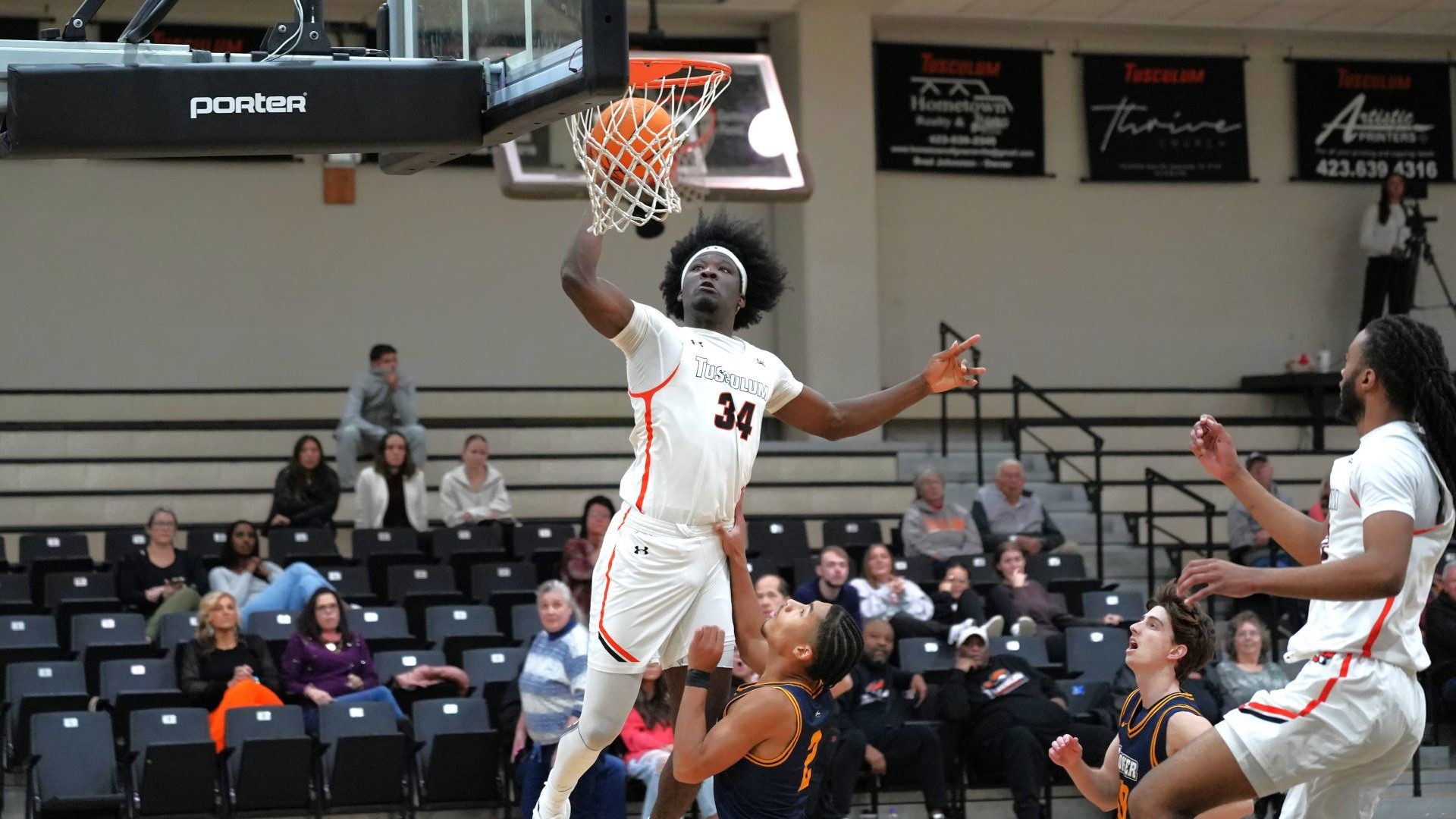 Akeem Odusipe recorded 15 points and 12 rebounds in Tusculum's 106-91 win over Coker (photo by Joe Yates)