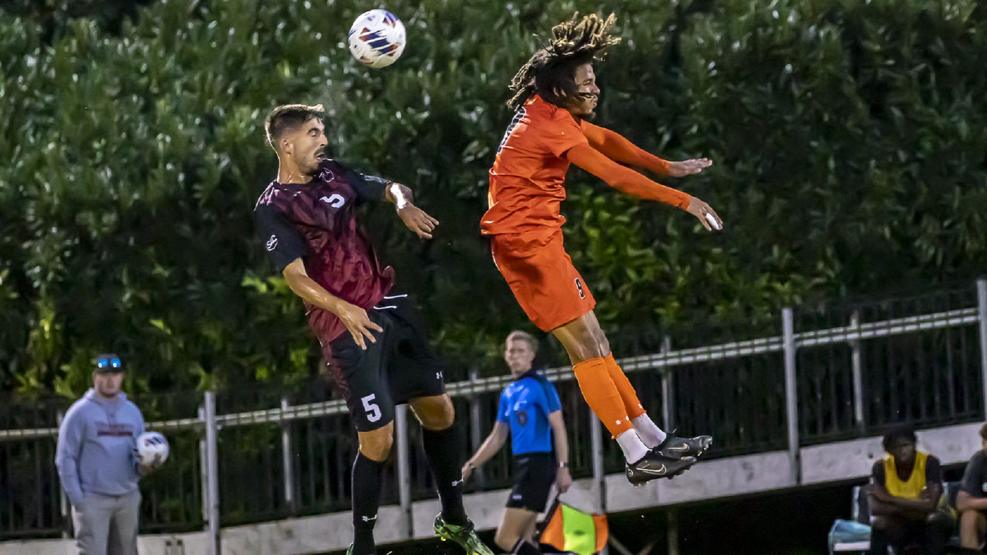 Tusculum's Damien Baltide skies with Lenoir-Rhyne's Xavi Moya (photo by Chuck Williams)