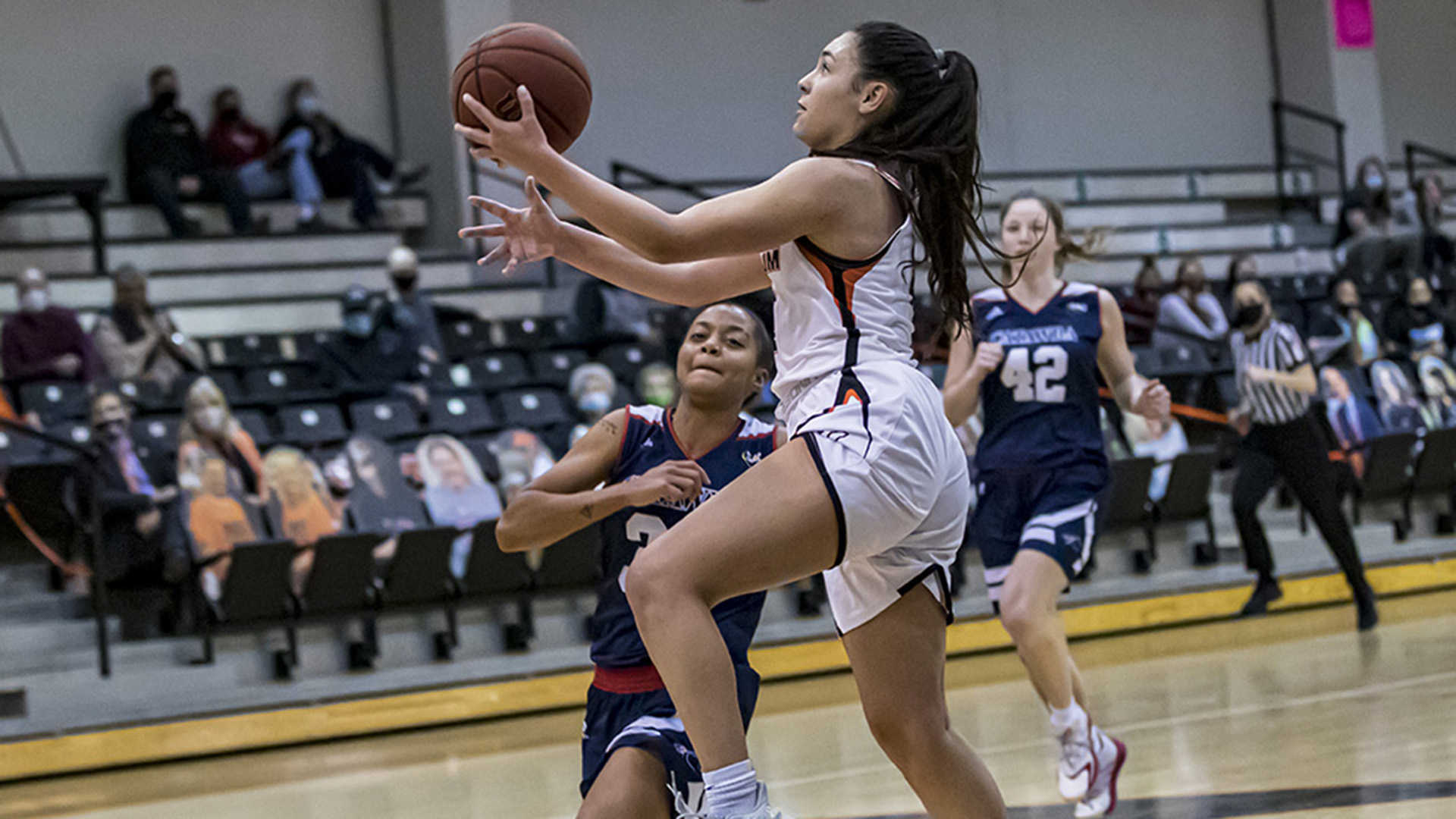 Marta Rodrigues beat the third-quarter buzzer for two of her 10 points (photo by Chuck Williams)