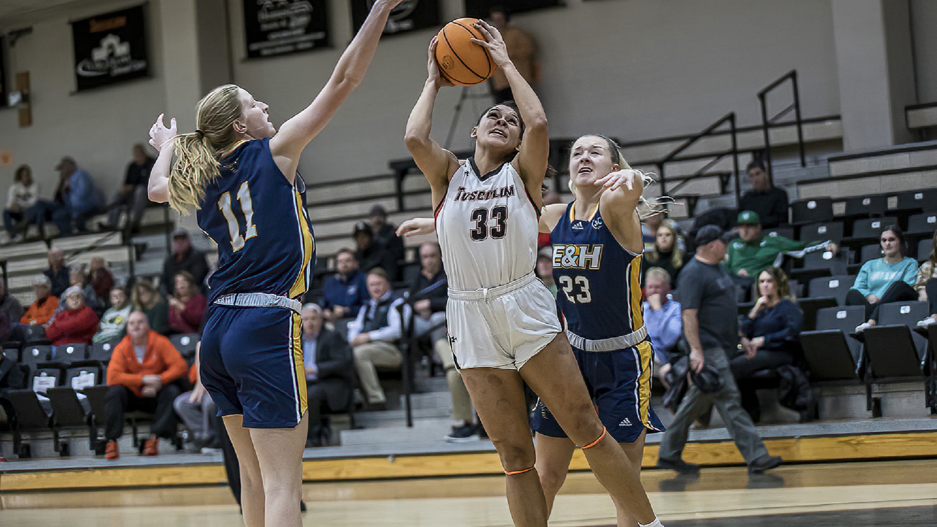 Jami Tham finished with a career-high 20 rebounds and posted her 12th double-double in as many games this season (photo by Chuck Williams)