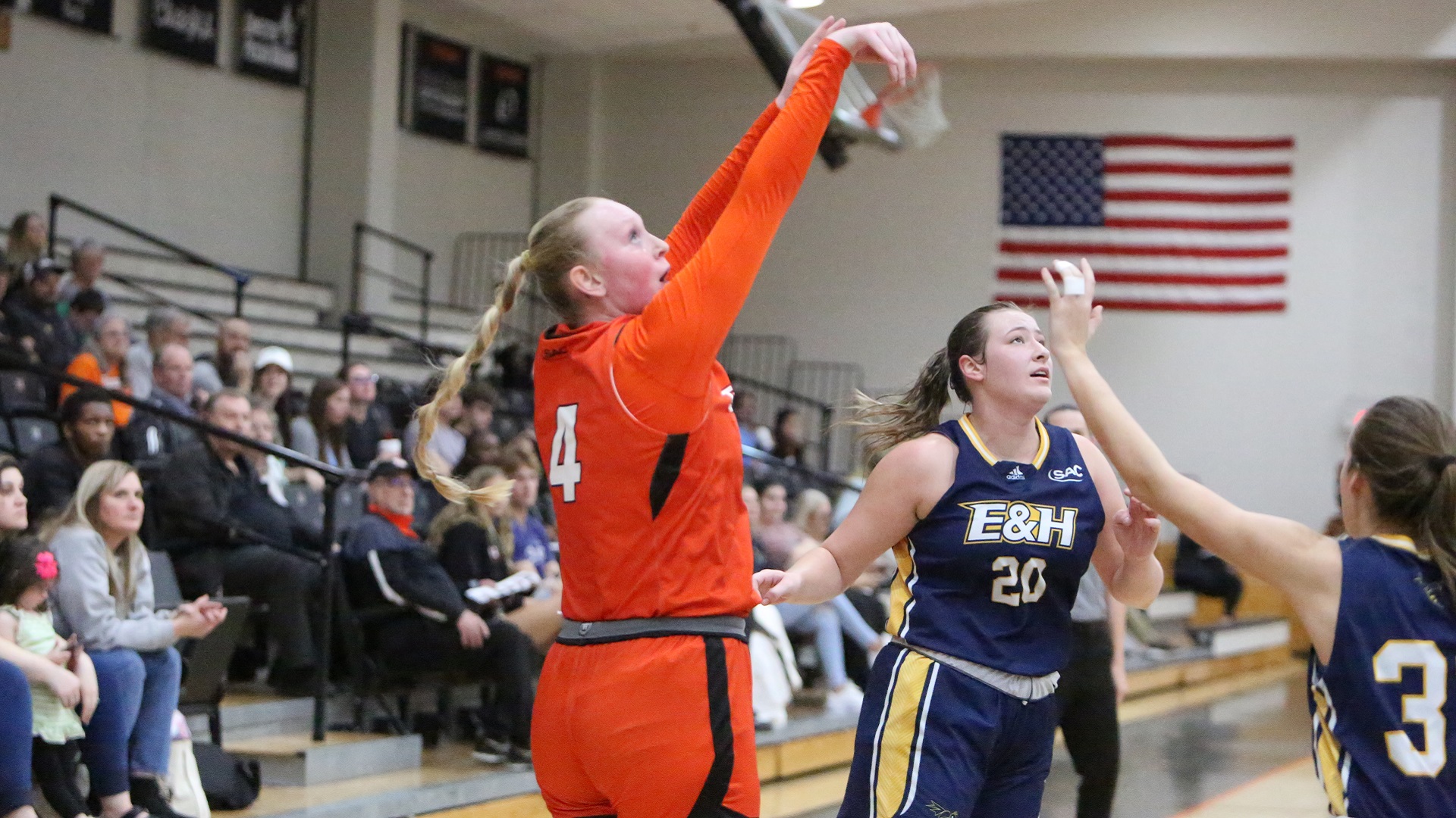 Jenna Kallenberg follows through on her fourth three-pointer against Emory & Henry, en route to a career-high 19 points (photo by Dom Donnelly)