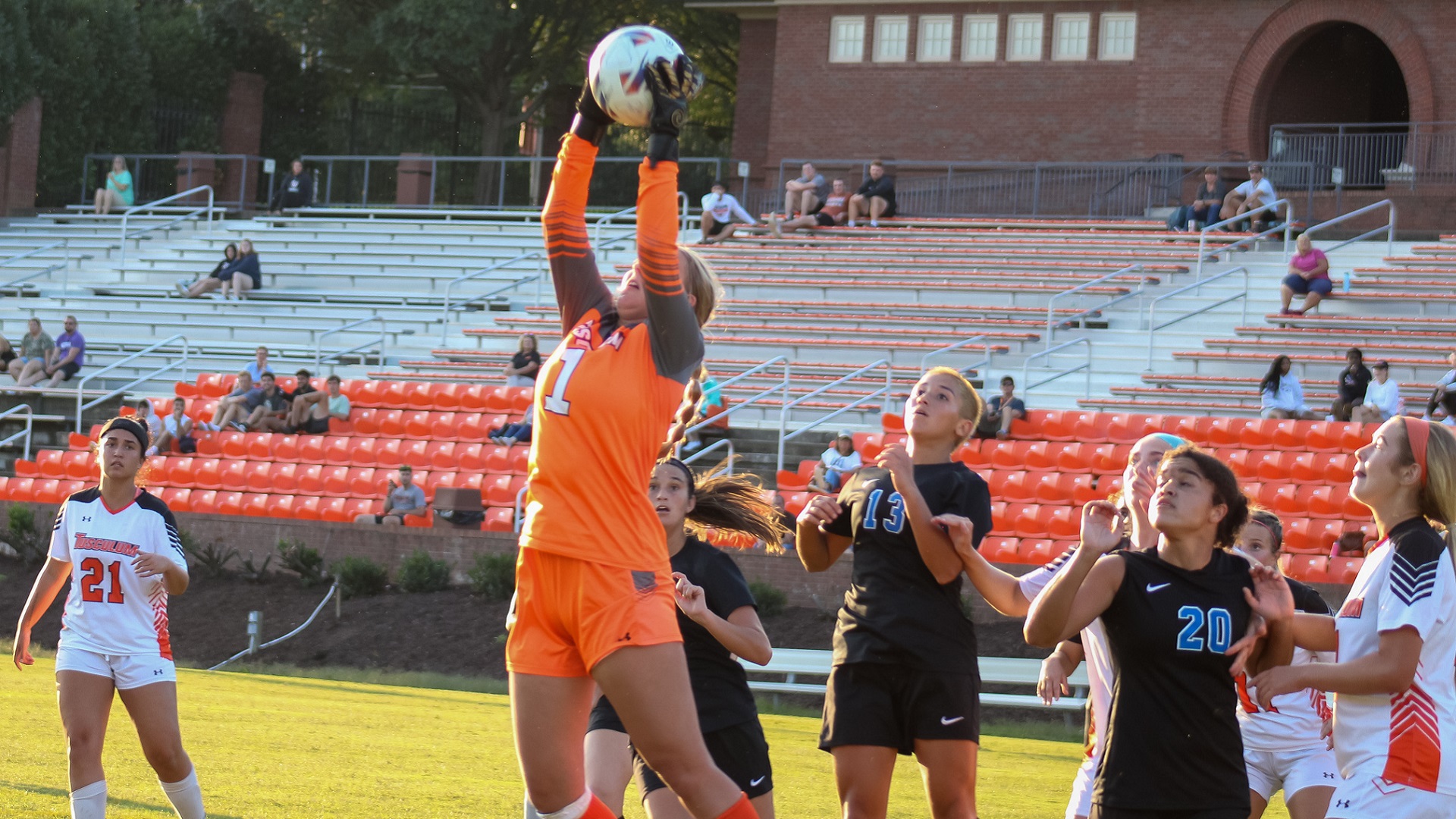 Grayson Patterson goes up to pull in a corner kick by UAH (photo by student photographer Kari Ham)