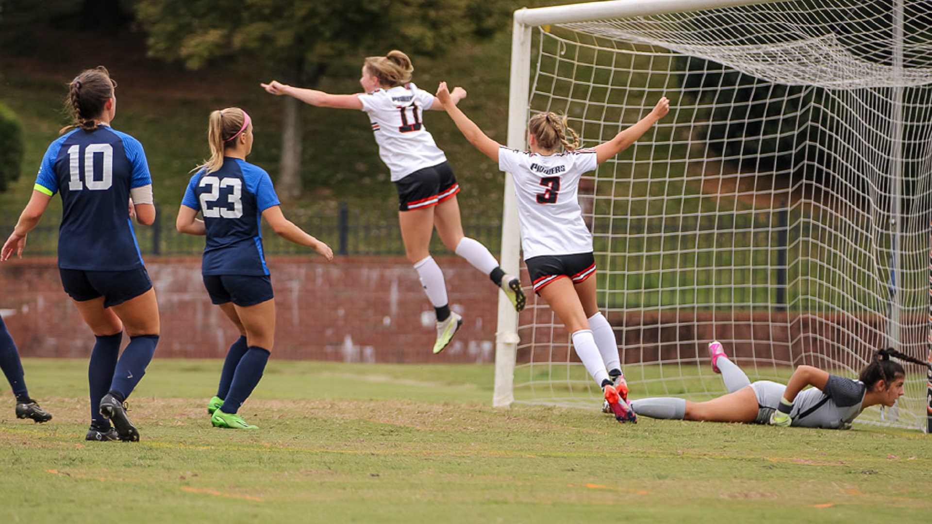 Brynn Stokes celebrates her first-half goal against Emory & Henry (photo by Kari Ham)